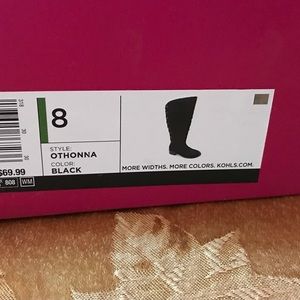 Women’s size 8, tall black boots, full zipper, lace up, sweater design at back.